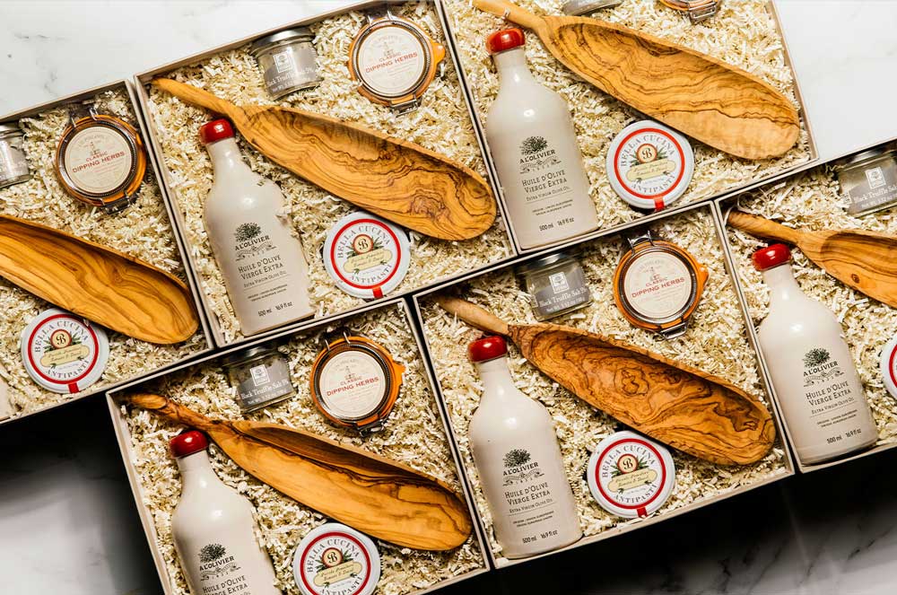 A corporate gifting professional selecting an ekuBOX luxury gift box for a client event — guide to picking the best corporate gift