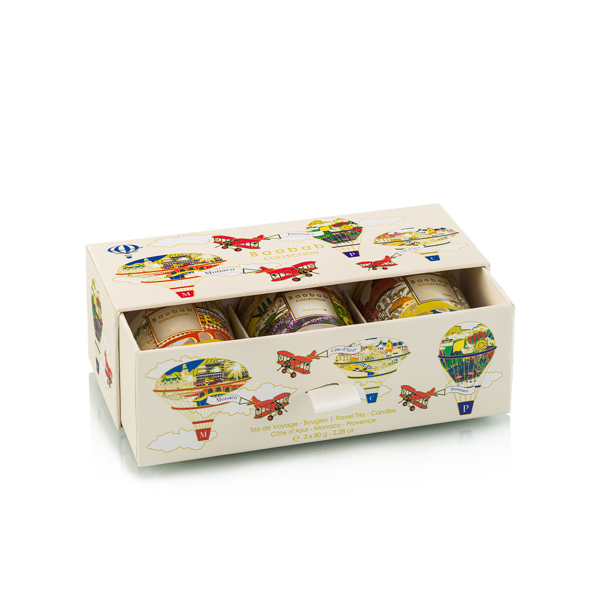 Baobab Collection travel candle trio featuring Côte d’Azur, Monaco, and Provence scents in a cream box with colorful hot air balloon illustrations on a white background.