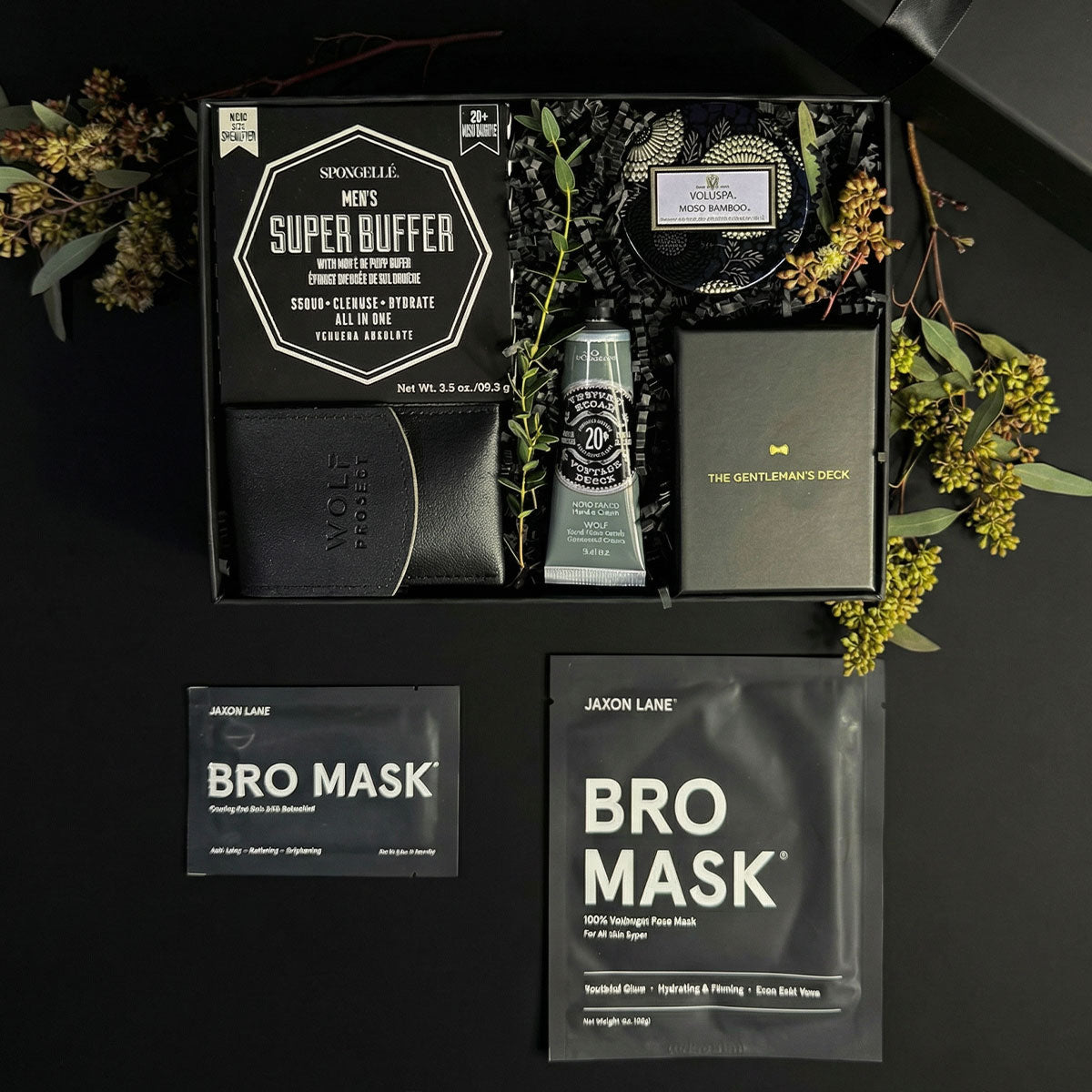 Men's grooming products including a 'Super Buffer' and 'Bro Mask' on a dark background with greenery.