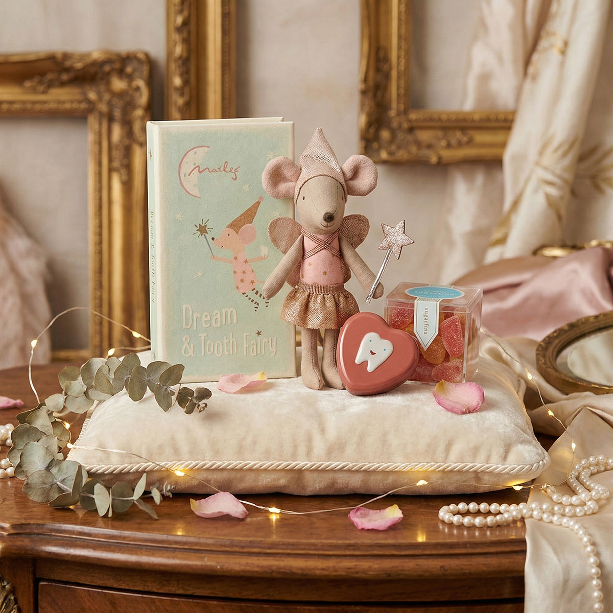 Maileg Tooth Fairy Big Sister Mouse in tutu and hat on a pillow in a bedroom setting