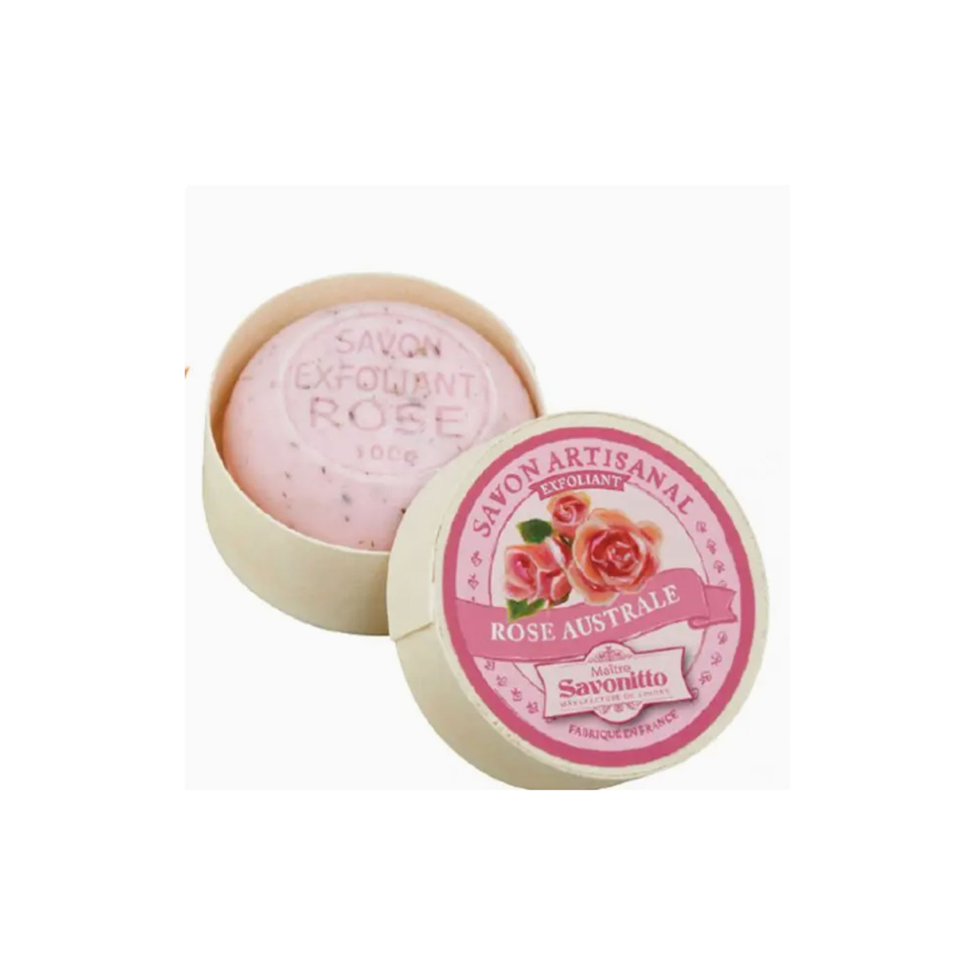 A round pink soap bar in a wooden container, with the lid placed in front showing a pink label with rose illustrations