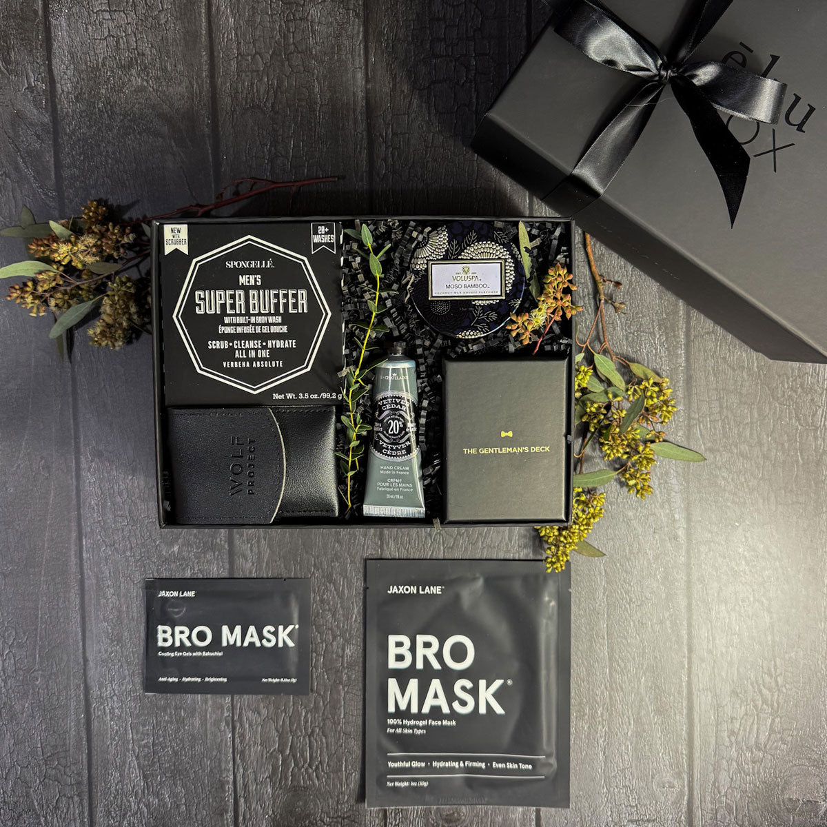 gift box for men with grooming items, mask, playing cards, lotion in black gift box