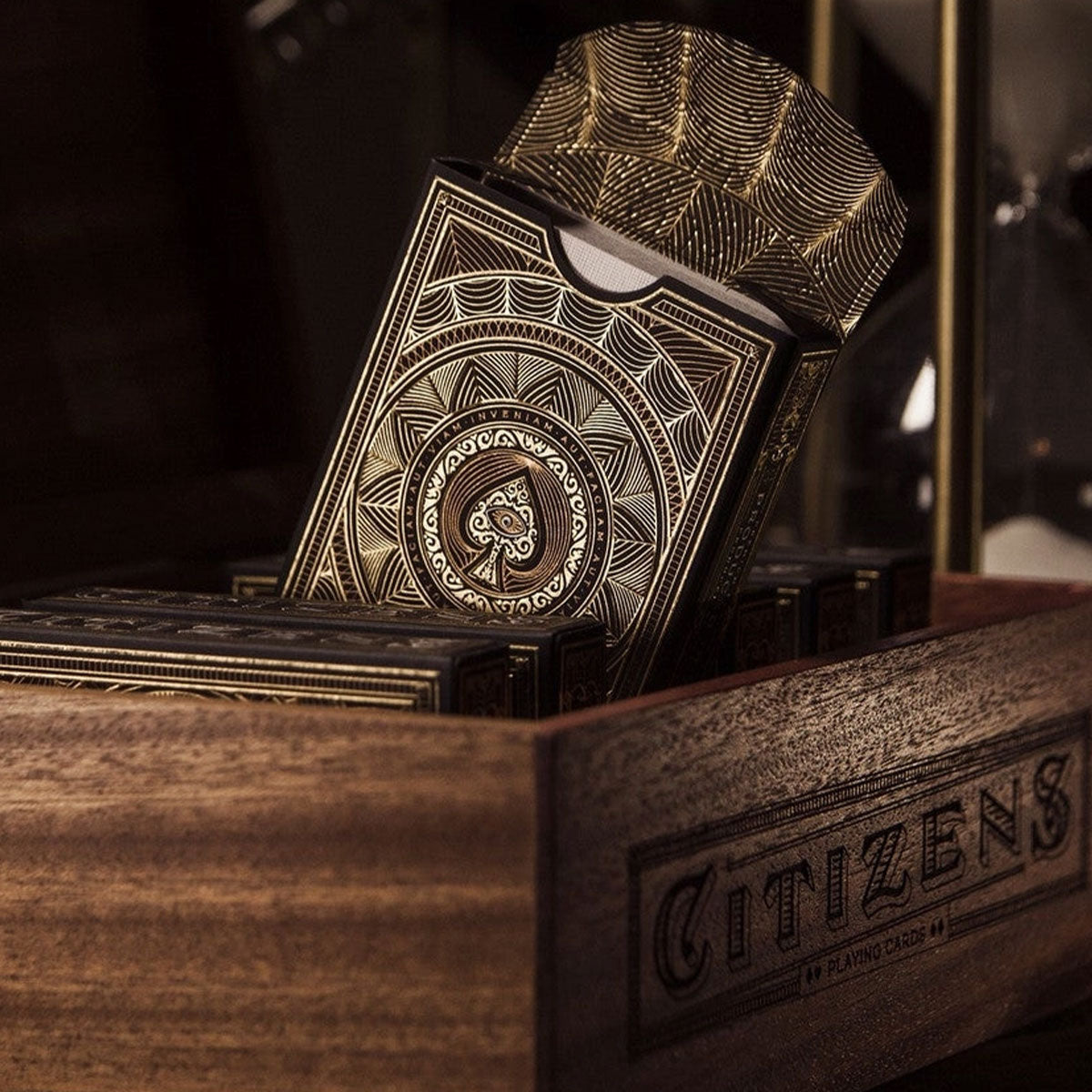 Citizens playing cards in a wooden box