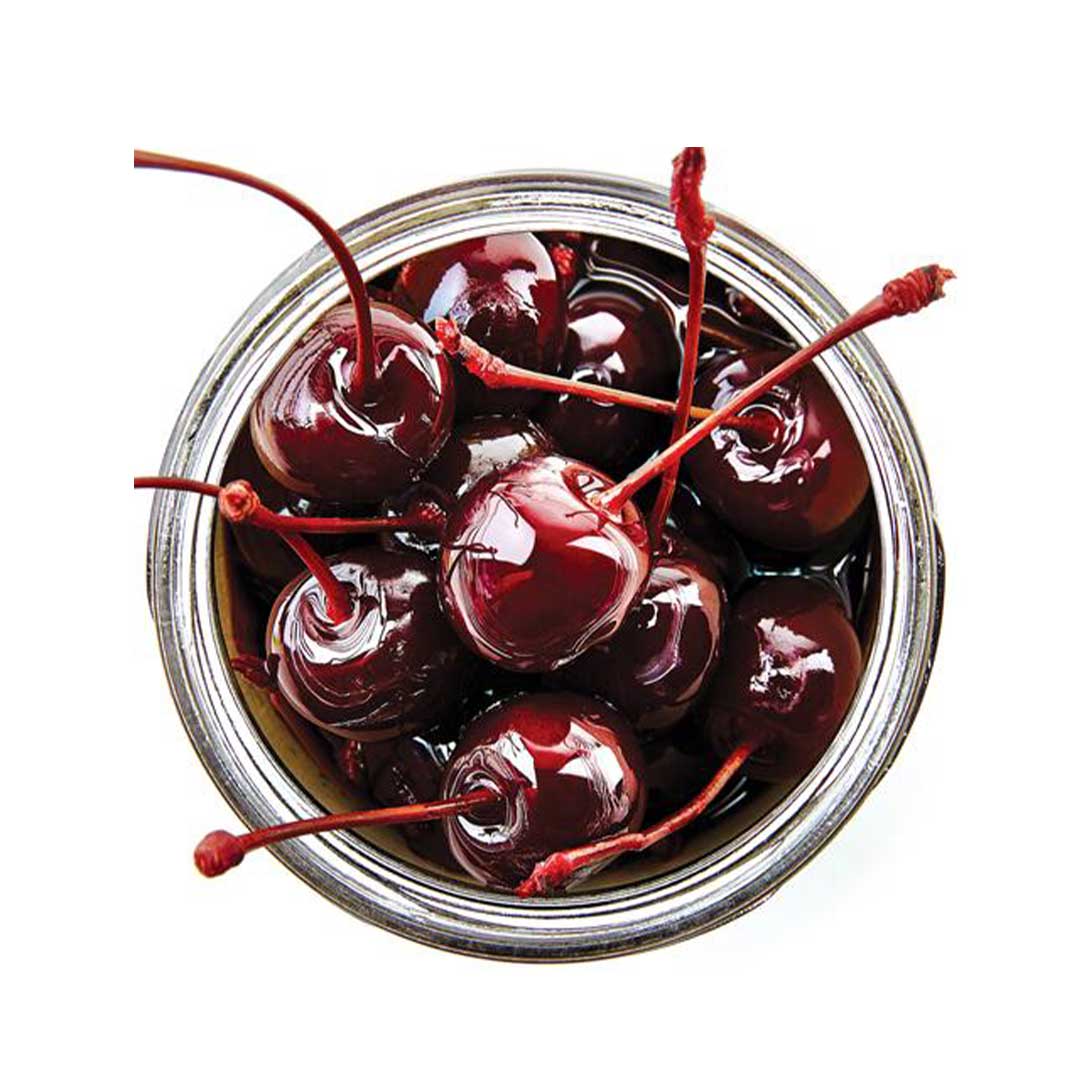glass jar of cocktail cherries on white background - non alcoholic