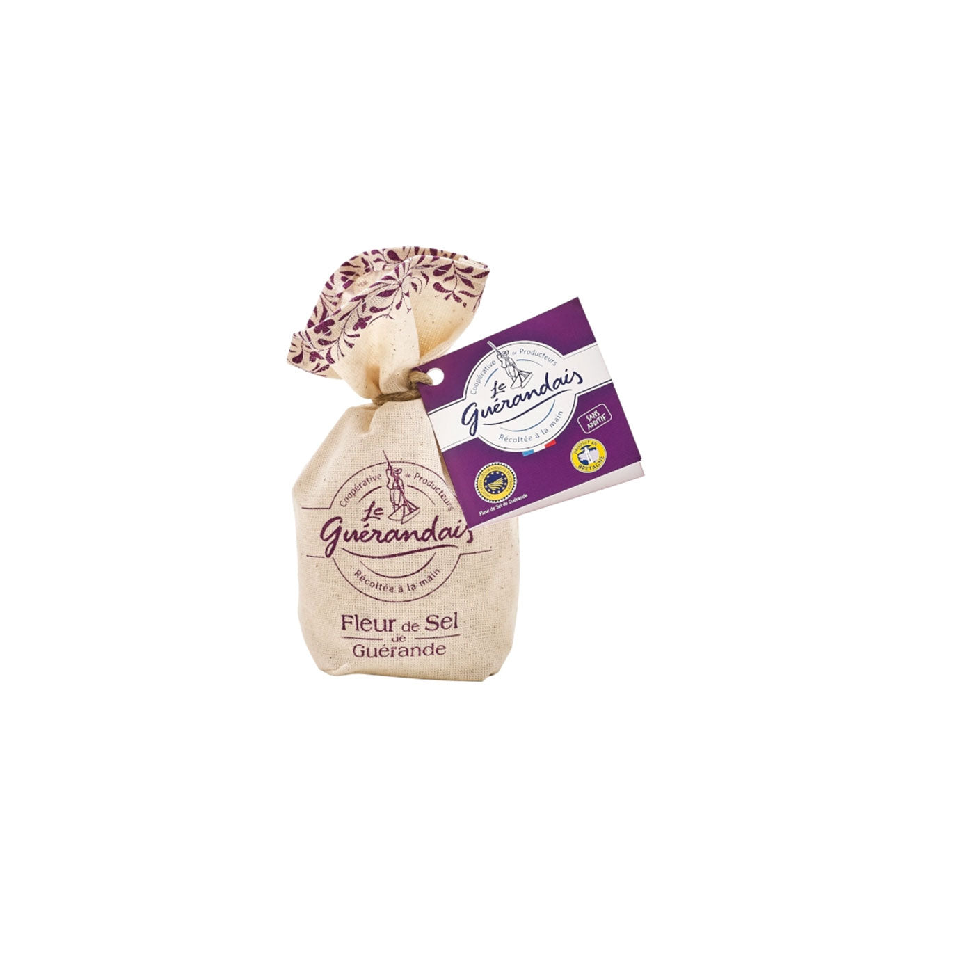 A small beige fabric pouch of Le Le Guermandais Fleur de Sel Guérande salt, tied with a patterned cloth