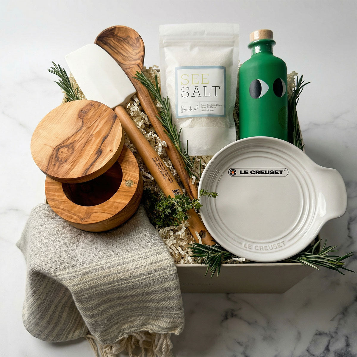 Gourmet Kitchen Essentials Gift Set with Le Creuset stoneware spoon rest, olive wood salt cellar, and olive oil