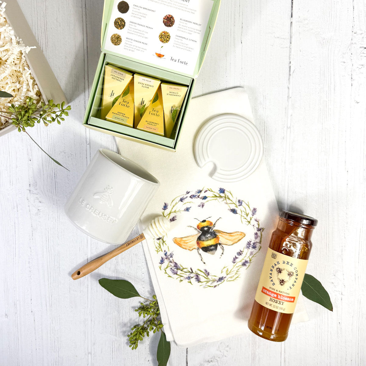 LE CREUSET HONEY POT AND DIPPER, HONEY, TEA, HAND TOWEL WITH BEE ON WHITE BACKGROUND AND GREENS