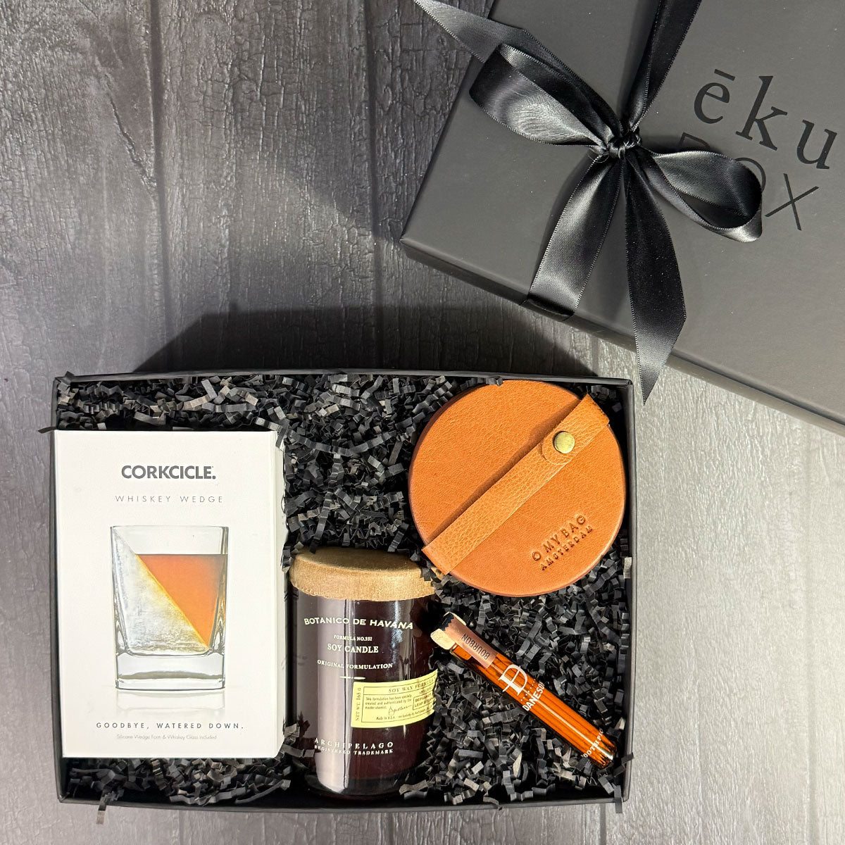 refined tastes with corkcicle whiskey wedge glass along with leather coasters and more PRESENTATION | ekuBOX