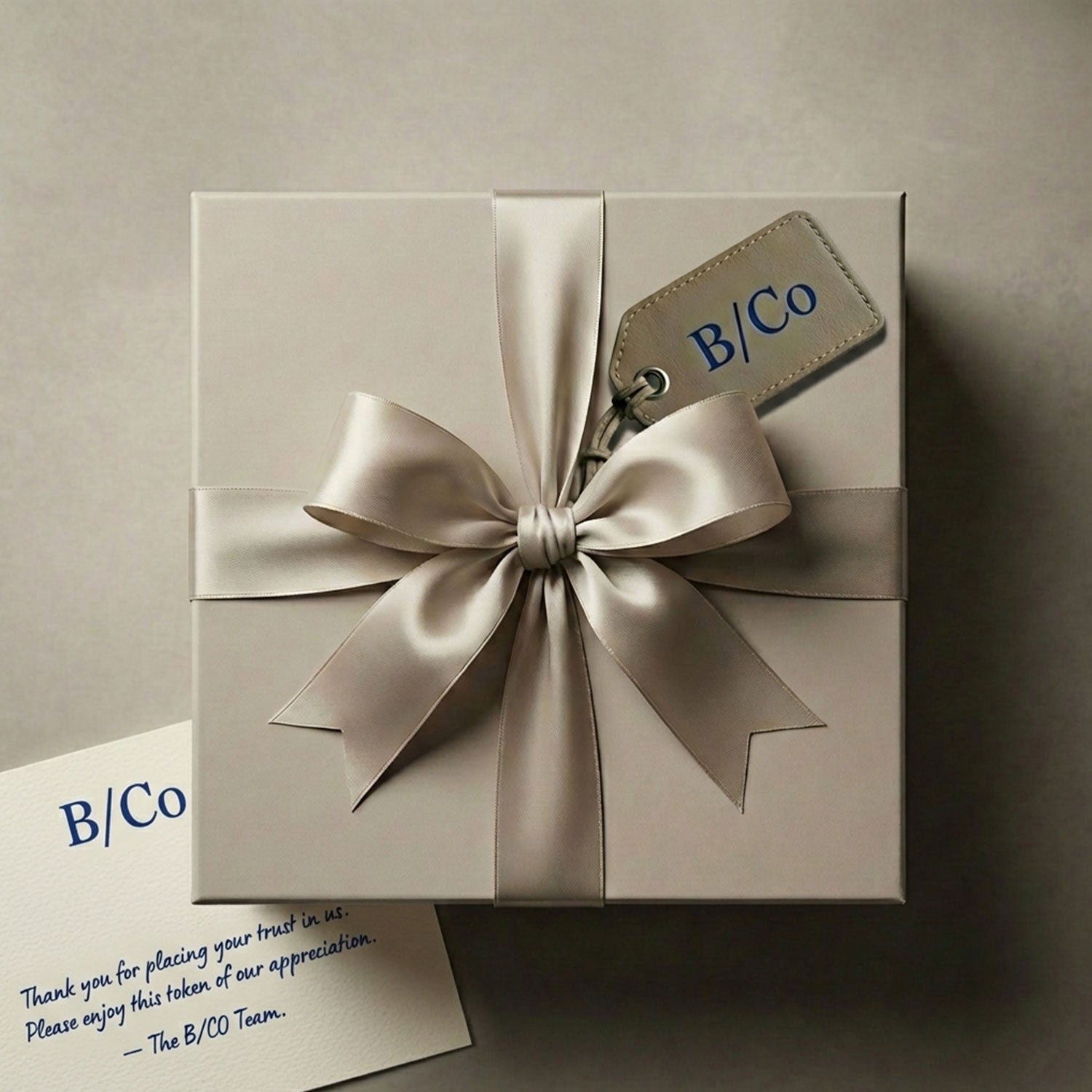 Branded semi-custom gift box with hang tag and branded gift note for corporate gifting.