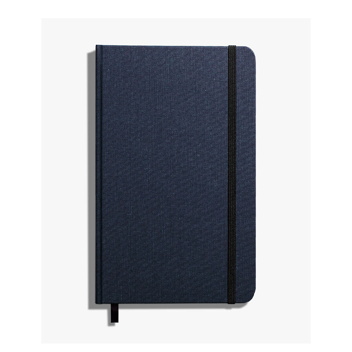Shinola Blue textured notebook with black strap on a white background