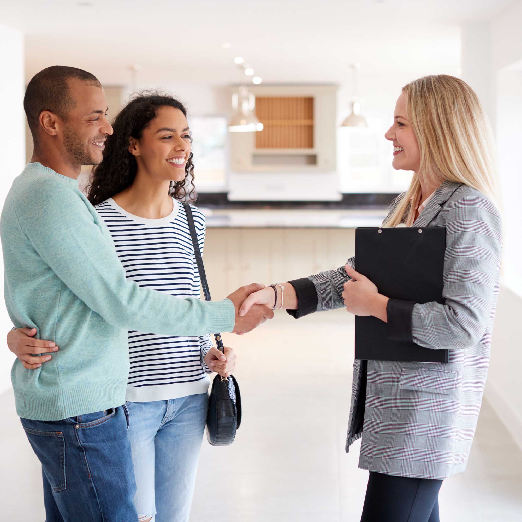 A luxury ekuBOX real estate closing gift box presented at a home closing — curated gifts that generate referrals for realtors