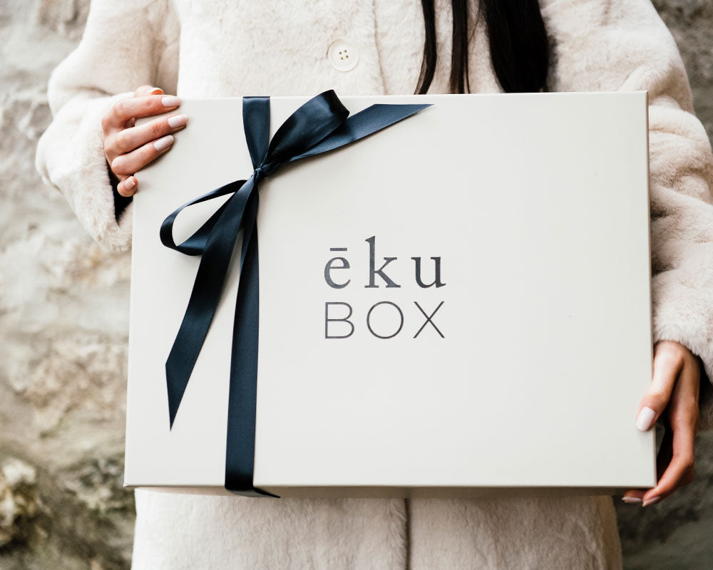 ekuBOX curated luxury gift box open on a table — how ekuBOX ends terrible gifting with thoughtful, beautifully presented gifts