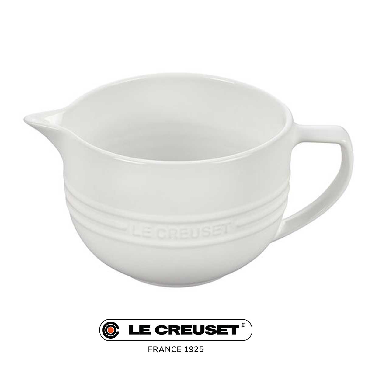 le creuset batter bowl in white on a white background with the le creuset logo