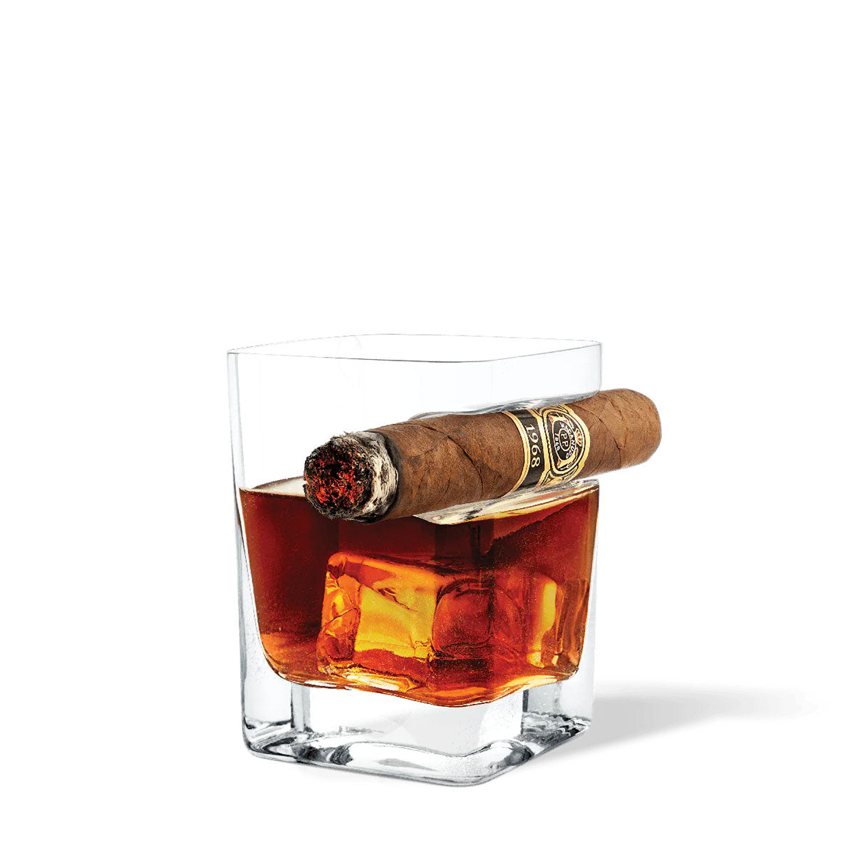 Corkcicle cigar glass with ice cubes and bourbon with a cigar on the side