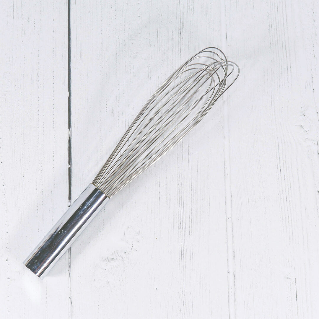 stainless steel whisk  on a  white background