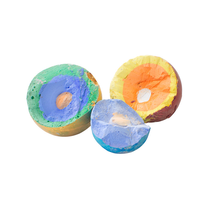 three spheres  of chalk planets cut in half showing the variations of color of each