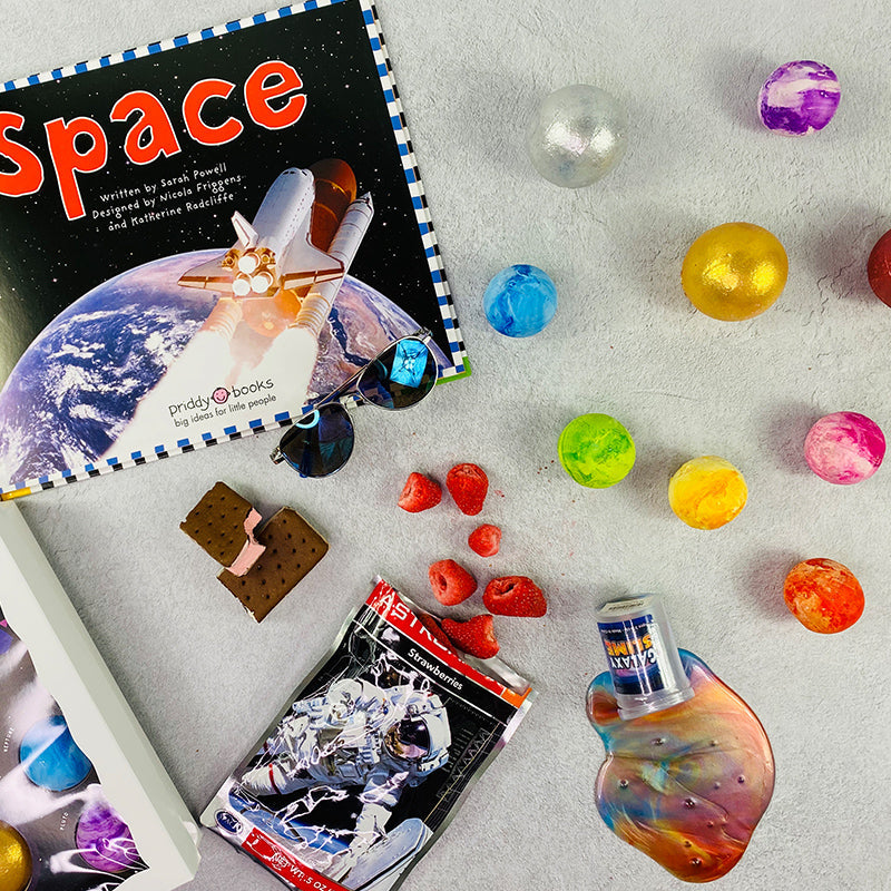 ekuBOX Lost in Space Gift Box for kids with astronaut snacks - for space-themed educational play.
