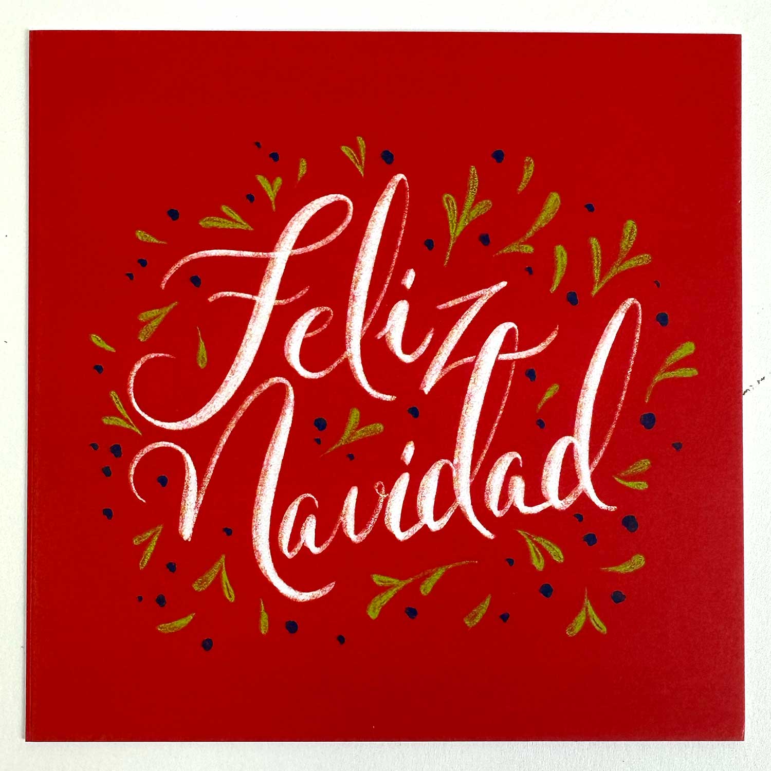 feliz navidad in white on a red background gift card choice