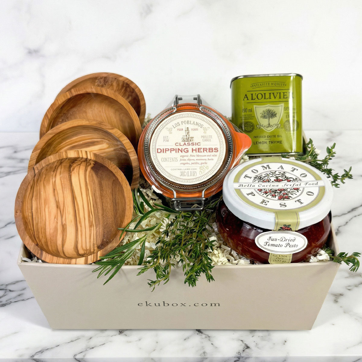 Gourmet Olive Oil Dipping Set gift box featuring  olive wood bowls, olive oil, pesto, and herbs 