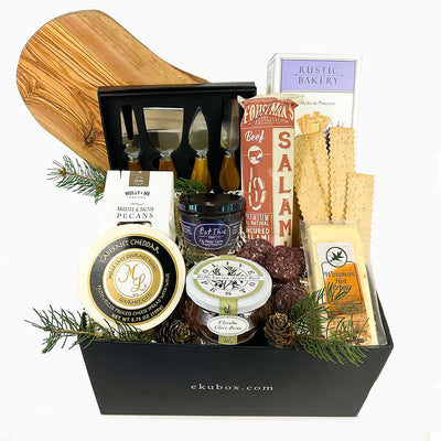 This is our Graze Charcuterie gift box. Filled with delicious cheese and artisan salami along with sourdough flat bread, pecans and a beautiful olive wood cutting board and serving utensils. Send one today
