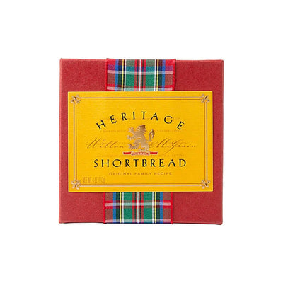 Heritage Shortbread packaging with red box and tartan ribbon on a white background