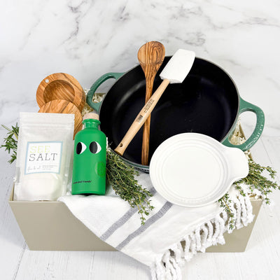 le creuset everyday pan and gourmet kitchen essentials gift set 
\ ekubox luxury gift sets shop gifts