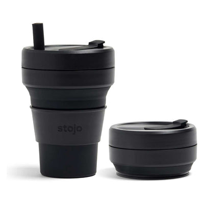 Black collapsible travel mug with straw lid on a white background