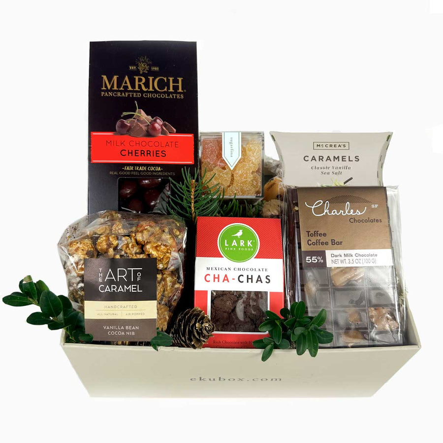 The perfect sweet gift basket for all filled with Marich West Coast Bing Cherries enrobed in Chocolate along with caramel popcorn, Sugarfina, caramels and more! ekuBOX Employee gifts, corporate gifts and gifts for anyone on your list.