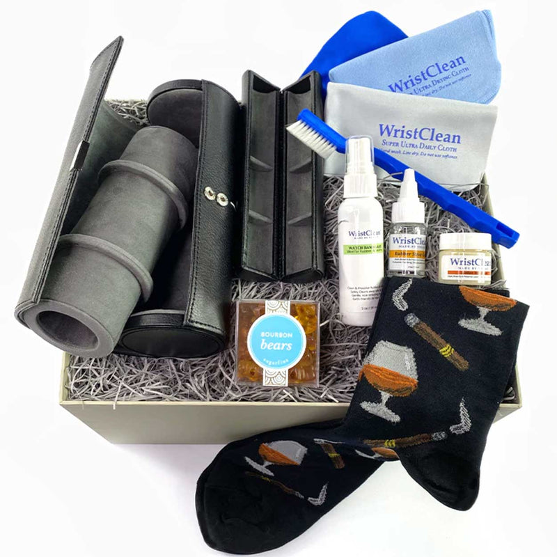 our watch lover's luxe gift box is filled with fabulous products the watch collector will love. Wolf 3 piece watch holder and jewelry compartment along with Wrist Clean cleaning set, socks and more. Shop curated gift boxes